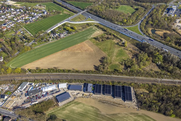 Aerial view, meadow area between the railway line and motorway A2, Derner Straße industrial area with construction site, meadows and fields, Horstmar, Lünen, Ruhr area, North Rhine-Westphalia, Germany, DE, Europe, aerial view, aerial photography, aerial photography, Münsterland, overview, bird's eye view, birds-eyes view, overview