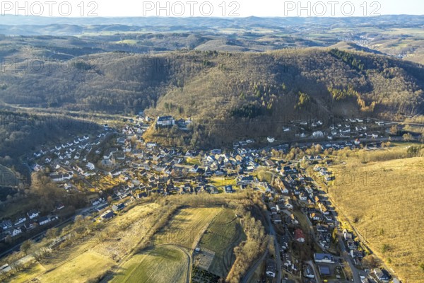 Aerial view, residential area, view of Bilstein district with castle, hilly landscape, Bilstein, Lennestadt, Sauerland, North Rhine-Westphalia, Germany, castle, DE, Europe, property tax, real estate, aerial view, aerial photography, aerial photography, overview, bird's-eye view, residential complex, living and living, residential area, residential quality, residential neighbourhood, housing estate, residential district, birds-eyes view, overview