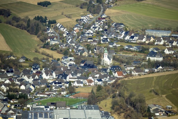 Aerial view, residential area and village view with catholic church St. Jakobus der Ältere in Elspe, Lennestadt, Sauerland, North Rhine-Westphalia, Germany, place of worship, DE, Europe, religious community, place of worship, property tax, holy site, real estate, church, parish, denomination, aerial view, aerial photography, aerial photography, religion, religious site, overview, bird's-eye view, residential area, living and life, residential area, residential quality, residential neighbourhood, housing estate, residential area, birds-eyes view, overview
