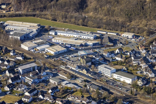 Aerial view, commercial area and railway station Grevenbrück, Lennestadt, Sauerland, North Rhine-Westphalia, Germany, railway station, platform, DE, Deutsche Bahn AG, Europe, commercial enterprises, commercial area, commercial property, commercial site, commercial use, main station, main railway station, industrial site, aerial view, aerial photography, aerial photography, overview, bird's-eye view, bird's-eye view, overview