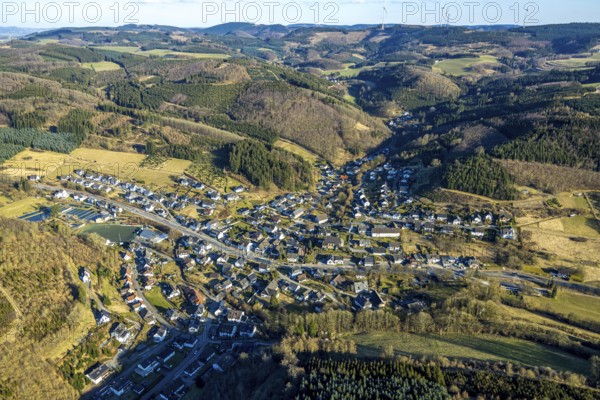 Aerial view, residential area, view of Oberelspe district, wooded area and hilly landscape, Oberelspe, Lennestadt, Sauerland, North Rhine-Westphalia, Germany, DE, Europe, property tax, real estate, aerial view, aerial photography, aerial photography, overview, bird's-eye view, residential complex, living and life, residential area, residential quality, residential neighbourhood, housing estate, residential district, birds-eyes view, overview
