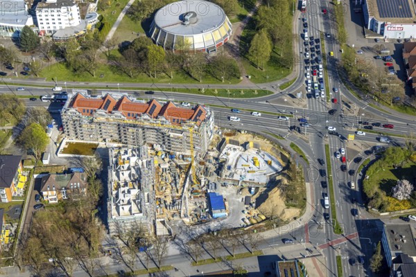 Aerial view, traffic junction construction site with new building Quartier Langestraße 100 between Lange Straße and Kurt-Schumacher-Straße, Lünen, Ruhr area, North Rhine-Westphalia, Germany, construction work, construction area, building site, building plots, construction project, construction site, DE, Europe, aerial view, aerial photography, aerial photography, Münsterland, overview, bird's-eye view, overview