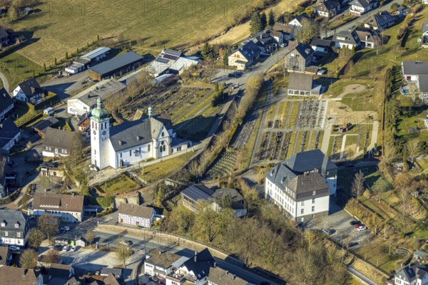 Aerial view, catholic church St. Jakobus der Ältere with Elspe cemetery, Elspe school, Elspe, Lennestadt, Sauerland, North Rhine-Westphalia, Germany, place of worship, DE, Europe, cemetery, memorial site, faith community, place of worship, house of God, graves, burial ground, holy place, church, church community, denomination, aerial photograph, aerial photography, aerial photography, religion, religious site, resting place, overview, bird's eye view, birds-eyes view, overview