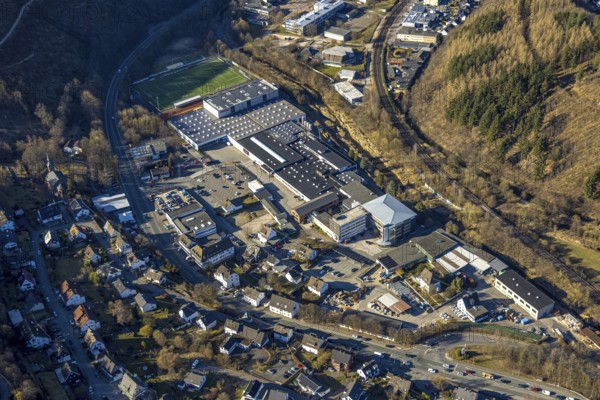 Aerial photo, Gustav Hensel GmbH factory premises, behind football stadium FC Lennestadt e.V., Altenhundem, Lennestadt, Sauerland, North Rhine-Westphalia, Germany, DE, Europe, football pitch, football stadium, football club, commercial enterprises, commercial area, commercial property, commercial site, commercial use, industrial site, aerial photograph, aerial photography, aerial photography, sports, sports facilities, sports field, sports facility, stadium, overview, bird's-eye view, bird's-eye view, overview