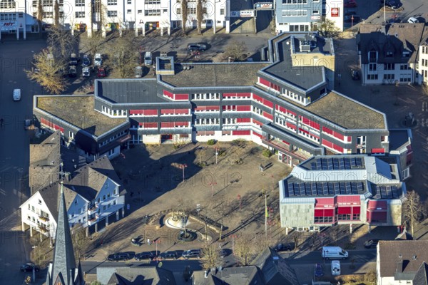 Aerial view, Lennestadt town hall and Thomas-Morus-Platz, spire of St. Agatha church, Altenhundem, Lennestadt, Sauerland, North Rhine-Westphalia, Germany, place of worship, authority, DE, Europe, religious community, place of worship, holy place, church, parish, denomination, aerial view, aerial photography, aerial photography, town hall, religion, religious site, city administration, overview, bird's eye view, birds-eyes view, overview