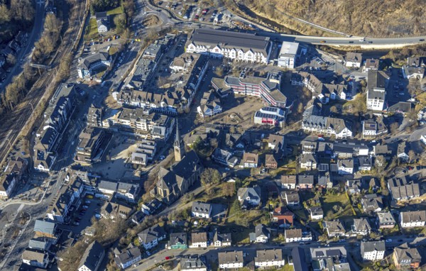 Aerial view, City centre with town hall and church St. Agatha and market place, HIT shopping centre, Altenhundem, Lennestadt, Sauerland, North Rhine-Westphalia, Germany, place of worship, authority, DE, shopping centre, shopping markets, shopping place, shopping centre, Europe, religious community, place of worship, holy place, church, parish, denomination, aerial view, aerial photography, aerial photography, local supply centre, town hall, religion, religious place, shopping centre, city administration, overview, bird's eye view, birds-eyes view, overview