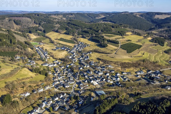 Aerial view, residential area town centre with St. Katharina Catholic Church, wooded area hilly landscape with forest damage, Heinsberg, Kirchhundem, Sauerland, North Rhine-Westphalia, Germany, place of worship, DE, Europe, place of worship, property tax, holy place, real estate, church, parish, aerial view, aerial photography, aerial photography, religion, overview, bird's eye view, residential complex, living and life, residential area, residential quality, residential quarter, housing estate, residential area, birds-eyes view, overview