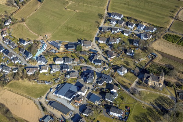 Aerial view, new residential area, local view Heisberg Albaum with church Herz-Jesu Albaum, Kirchhundem, Sauerland, North Rhine-Westphalia, Germany, place of worship, DE, Europe, place of worship, property tax, holy place, real estate, church, parish, aerial view, aerial photography, aerial photography, religion, overview, bird's eye view, residential complex, living and life, residential area, residential quality, residential neighbourhood, housing estate, residential area, bird's eye view, overview