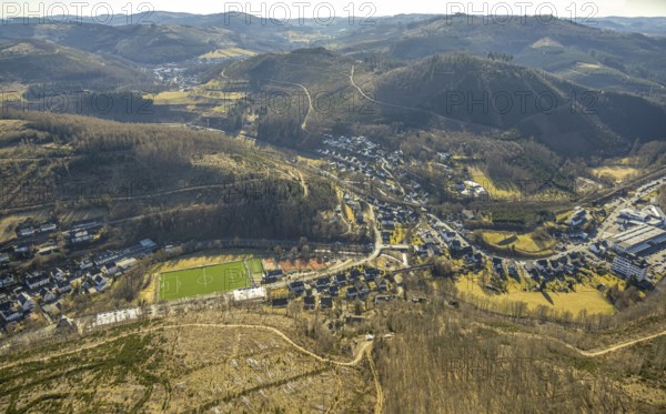 Aerial view, football stadium sports field FC Kirchhundem and tennis courts TC Rot-Weiß Kirchhundem e.V., Berg Köpfchen and local view residential area Waldsiedlung, Kirchhundem, Sauerland, North Rhine-Westphalia, Germany, DE, Europe, football pitch, football stadium, property tax, real estate, aerial view, aerial photography, aerial photography, sports, sports facilities, sports field, sports facility, stadium, tennis, tennis facility, tennis courts, tennis club, overview, bird's-eye view, residential complex, living and life, residential area, residential quality, residential neighbourhood, housing estate, residential area, birds-eyes view, overview