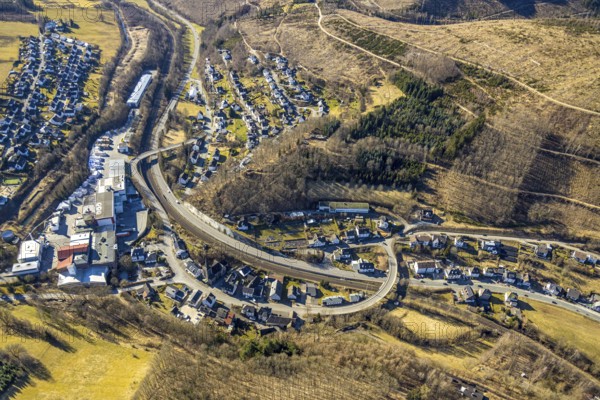 Aerial view, town view and curved Antoniusstraße with bridge over the federal road B517 in Hofolpe, Kirchhundem, Sauerland, North Rhine-Westphalia, Germany, DE, Europe, aerial view, aerial photography, aerial photography, overview, bird's-eye view, overview