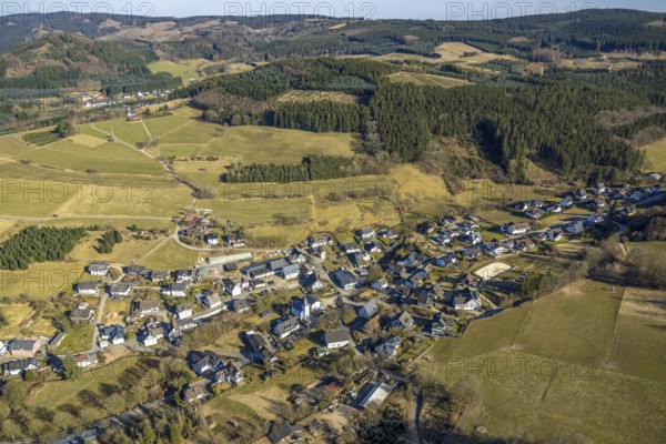 Aerial view, residential area, view of Marmecke with St. Antonius Church, wooded area, hilly landscape with forest damage, Marmecke, Kirchhundem, Sauerland, North Rhine-Westphalia, Germany, place of worship, DE, Europe, place of worship, property tax, holy place, real estate, church, parish, aerial view, aerial photography, aerial photography, religion, overview, bird's eye view, residential complex, living and life, residential area, residential quality, residential neighbourhood, housing estate, residential area, birds-eyes view, overview