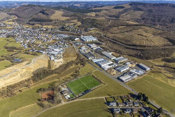Aerial view, commercial area In der Welsmicke, football stadium sports ground SV Rahrbachtal 1989 e.V., Rahrbach, Kirchhundem, Sauerland, North Rhine-Westphalia, Germany, DE, Europe, football pitch, football stadium, commercial enterprises, commercial area, commercial property, commercial site, commercial use, industrial area, industrial site, aerial photograph, aerial photography, aerial photography, sports, sports facilities, sports ground, sports facility, stadium, overview, bird's-eye view, bird's-eye view, overview