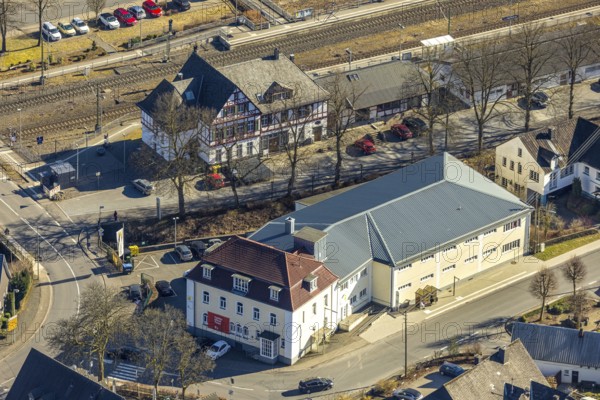 Aerial view, half-timbered station building Kirchhundem-Welschen Ennest railway station, tracks and level crossing, Welschen Ennest, Kirchhundem, Sauerland, North Rhine-Westphalia, Germany, DE, Europe, aerial view, aerial photography, aerial photography, overview, bird's-eye view, bird's-eye view, overview