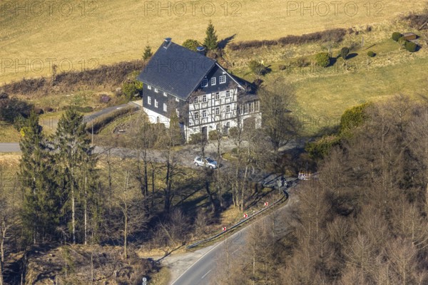 Aerial view, road traffic with car and motorbike at the half-timbered house in Welschen Ennest, Kirchhundem, Sauerland, North Rhine-Westphalia, Germany, DE, Europe, aerial view, aerial photography, aerial photography, overview, bird's-eye view, overview