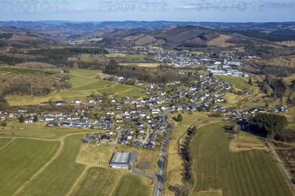 Aerial view, local view with church Rahrbach and old school, hilly landscape with distant view, below McDart GmbH Dartbedarf und Handel, Rahrbach, Kirchhundem, Sauerland, North Rhine-Westphalia, Germany, place of worship, education, educational institution, DE, Europe, place of worship, holy place, church, parish, educational institute, aerial view, aerial photography, aerial photography, religion, school, overview, bird's-eye view, overview