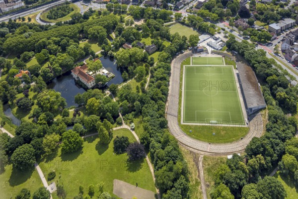 Aerial view, Strünkede Castle moated castle with moat and castle park and Edeka Koch sports park football stadium sports facility stadium at Strünkede Castle of SC Westfalia 04 Herne e. V., Baukau, Herne, Ruhr area, North Rhine-Westphalia, Germany, castle, DE, Europe, football pitch, football stadium, moat, manor house, aerial view, aerial photography, aerial photography, castle, sports, sports facilities, sports field, sports facility, stadium, overview, bird's-eye view, moated castle, moat, moated castle, birds-eyes view, overview, HernerechtsderA43