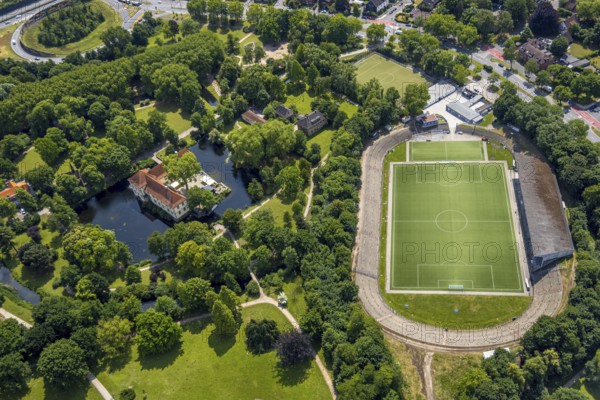 Aerial view, Strünkede Castle moated castle with moat and castle park and Edeka Koch sports park football stadium sports facility stadium at Strünkede Castle of SC Westfalia 04 Herne e. V., Baukau, Herne, Ruhr area, North Rhine-Westphalia, Germany, castle, DE, Europe, football pitch, football stadium, moat, manor house, aerial view, aerial photography, aerial photography, castle, sports, sports facilities, sports field, sports facility, stadium, overview, bird's-eye view, moated castle, moat, moated castle, birds-eyes view, overview, HernerechtsderA43
