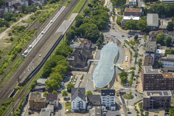 Aerial view, bus station with futuristic roof at Konrad-Adenauer-Platz, Herne main station, Baukau, Herne, Ruhr area, North Rhine-Westphalia, Germany, railway area, railway station, bus, bus station, bus stop, buses, DE, Deutsche Bahn AG, Europe, railway tracks, tracks, main station, central station, roundabout, roundabout, aerial view, aerial photography, aerial photography, bus station, overview, bird's-eye view, ZOB, birds-eyes view, overview, HernerechtsderA43