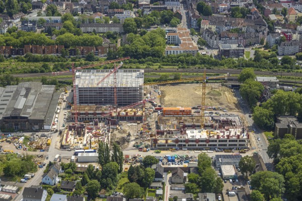 Aerial view, construction site and demolition work for new FunkenbergQuartier between Baumstraße and Fabrikstraße, Baukau, Herne, Ruhr area, North Rhine-Westphalia, Germany, demolition work, workers, architecture, construction work, construction vehicles, construction area, construction site, building plots, construction measure, Baumstraße, construction project, construction site, DE, development, renewal, Europe, Fabrikstraße, progress, Funkenbergquartier, building, site, commercial enterprises, commercial area, commercial area, commercial property, commercial park, commercial site, commercial use, industrial area, industrial site, infrastructure, construction, construction technology, cranes, landscape, aerial view, aerial photography, aerial photography, machinery, modernisation, new construction, planning, projects, redevelopment, city, roads, structure, urban, technology, overview, urban, change, bird's-eye view, destruction, birds-eyes view, overview, HernerechtsderA43