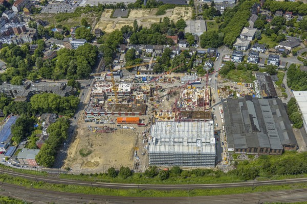 Aerial view, construction site and demolition work for new FunkenbergQuartier between Baumstraße and Fabrikstraße, Baukau, Herne, Ruhr area, North Rhine-Westphalia, Germany, demolition work, workers, architecture, construction work, construction vehicles, construction area, construction site, building plots, construction measure, Baumstraße, construction project, construction site, DE, development, renewal, Europe, Fabrikstraße, progress, Funkenbergquartier, building, site, commercial enterprises, commercial area, commercial area, commercial property, commercial park, commercial site, commercial use, industrial area, industrial site, infrastructure, construction, construction technology, cranes, landscape, aerial view, aerial photography, aerial photography, machinery, modernisation, new construction, planning, projects, redevelopment, city, roads, structure, urban, technology, overview, urban, change, bird's-eye view, destruction, birds-eyes view, overview, HernerechtsderA43