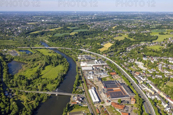 Aerial view, Kupferdreher Straße industrial estate on the Ruhr river with Kampmannbrücke bridge and A44 motorway, Kupferdreh, Essen, Ruhr area, North Rhine-Westphalia, Germany