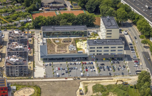 Aerial view, Kaiserquartier Herne, shopping centre and construction site with new construction of a residential complex and housing estate, green roof, Baukau, Herne, Ruhr area, North Rhine-Westphalia, Germany, construction work, construction area, building site, building plots, construction project, construction site, DE, Europe, property tax, real estate, aerial view, aerial photography, aerial photography, new building, overview, bird's-eye view, housing estate, housing and living, residential area, quality of living, residential neighbourhood, housing estate, residential area, birds-eyes view, overview, HernerechtsderA43