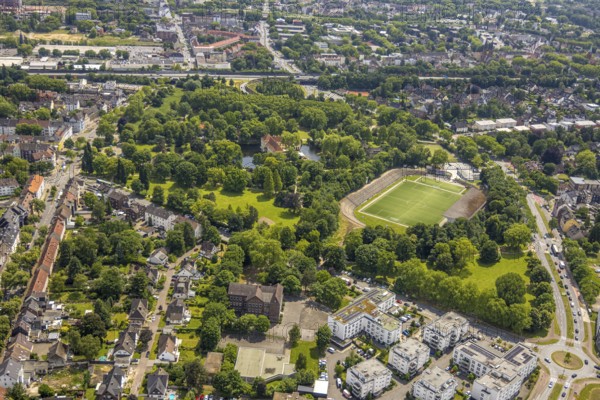Aerial view, castle park with Strünkede Castle moated castle, Protea Wohnen Am Schloss senior citizens' campus, Westring and Forellstraße roundabout, Edeka Koch sports park football stadium sports facility stadium at Strünkede Castle of SC Westfalia 04 Herne e. V., Baukau, Herne, Ruhr area, North Rhine-Westphalia, Germany, care and nursing, DE, Europe, aerial view, aerial photography, aerial photography, care facility, retirement home, retirement residence, retirement home, retirement centre, overview, bird's-eye view, overview, HernerechtsderA43