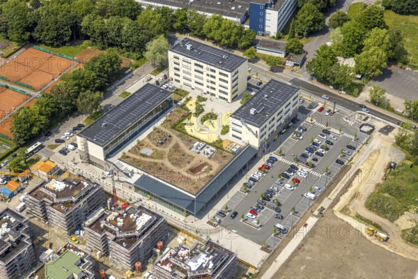 Aerial view, Kaiserquartier Herne shopping centre, construction site with new construction of a residential complex and housing estate, green roof, Baukau, Herne, Ruhr area, North Rhine-Westphalia, Germany, construction work, construction area, construction site, building plots, construction project, construction site, DE, Europe, property tax, real estate, aerial view, aerial photography, aerial photography, new building, overview, bird's-eye view, housing estate, housing and living, residential area, quality of living, residential neighbourhood, housing estate, residential area, birds-eyes view, overview, HernerechtsderA43