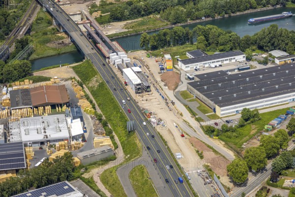 Aerial view, construction site with new construction, railway bridge Emscherbrücke Rollbahn, motorway A43 with bridge over Rhine-Herne Canal, Baukau, Herne, Ruhr area, North Rhine-Westphalia, Germany, A43, architecture, motorway, construction work, construction area, construction site, construction sites, Baukau-West, construction measure, construction project, construction site, construction site vehicles, bridge, bridge construction, DE, railway bridge, Emscherbrücke, Europe, river, water, large construction site, industry, industrial site, infrastructure, infrastructure project, canal, construction, landscape, aerial view, aerial photography, aerial photography, metal processing, Rhine-Herne Canal, runway, Ruhr area scene, rail, sinter works, city, road, transport, overview, urban, traffic, bird's-eye view, birds-eyes view, modern architecture, overview, linksderA43, HernelinksderA43