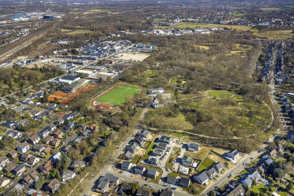 Aerial view, SEG Herne construction site with new building Schäferstraße Am Stadtgarten, Stadtgarten with ParkHotel, sports field Schäferstraße, behind commercial area Trimbuschhof, Herne-Mitte, Herne, Ruhr area, North Rhine-Westphalia, Germany, construction work, construction area, construction site, building plots, construction project, construction project, construction site, DE, Europe, football pitch, football stadium, football club, gastronomy, aerial view, aerial photography, aerial photography, local recreation area, new construction, shell construction, sport, sports facilities, sports field, sports facility, stadium, overview, bird's-eye view, birds-eyes view, green lung, overview