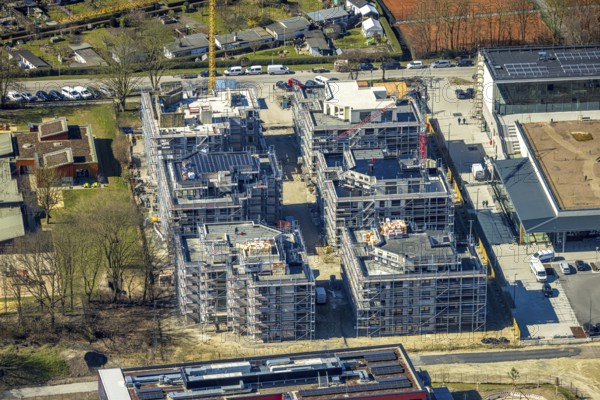 Aerial view, Kaiserquartier Herne, construction site with new construction of a residential complex and housing estate, Lackmanns Hof kindergarten and high-rise residential estate, Baukau, Herne, Ruhr area, North Rhine-Westphalia, Germany, architecture, construction work, construction site, DE, development, Europe, progress, building, high-rise building, infrastructure, Kaiserquartier, kindergarten, daycare centre, complex, construction, Lackmanns Hof, aerial view, aerial photography, aerial photography, new construction, new buildings, perspective, region, settlement, sport, city, urban development, urban planning, tennis, tennis facility, tennis courts, tennis club, overview, urban, bird's-eye view, residential complex, residential building, residential estate, birds-eyes view, modern, overview
