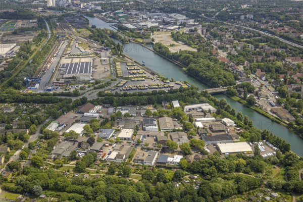 Aerial view, industrial area Resser Straße and at the western harbour, Rhine-Herne-Canal, at the back right open space AltCrange, shaft 5 at the Cranger Kirmesplatz and concrete bunker with cross and crescent by the artist Helmut Bettenhausen, lock Wanne-Eickel, Unser Fritz, Herne, Ruhr area, North Rhine-Westphalia, Germany, DE, Europe, commercial enterprises, commercial area, commercial area, commercial property, commercial park, commercial location, commercial use, industrial area, industrial location, aerial view, aerial photography, aerial photography, overview, bird's-eye view, birds-eyes view, overview, linksderA43, HernelinksderA43