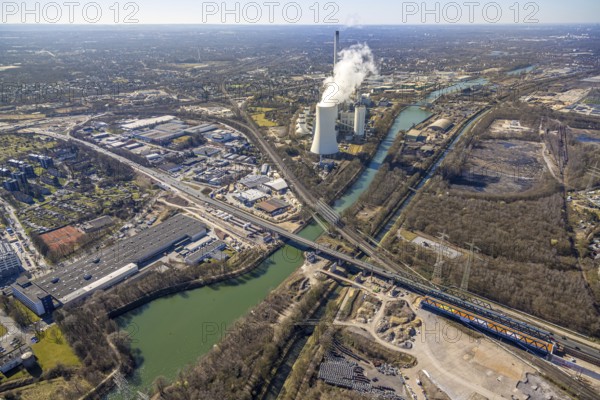 Aerial view, Rhine-Herne Canal, STEAG cogeneration plant Herne and cooling tower with steam cloud, Emscherbrücke Rollbahn (Wanne-Eickel - Hamburg), motorway bridge A43, Baukau, Herne, Ruhr area, North Rhine-Westphalia, Germany, bridge, DE, Europe, canal, power plant, aerial view, aerial photography, aerial photography, overview, bird's-eye view, bird's-eye view, overview