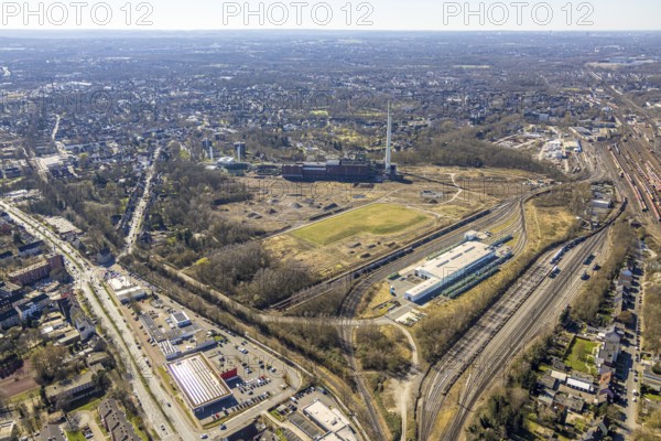Aerial view, former Uniper power plant Shamrock, open space and construction site, former mine site General Blumenthal, town view with distant view, Wanne-Süd, Herne, Ruhr area, North Rhine-Westphalia, Germany, architecture, exterior view, construction work, construction site, mine site, DE, energy, development, Europe, distant view, open space, building, site, General Blumenthal, history, industry, industrial history, infrastructure, landscape, aerial view, aerial photography, aerial photography, modernisation, site view, perspective, reconstruction, Shamrock, town, structure, overview, Uniper power plant, bird's eye view, birds-eyes view, overview, overview