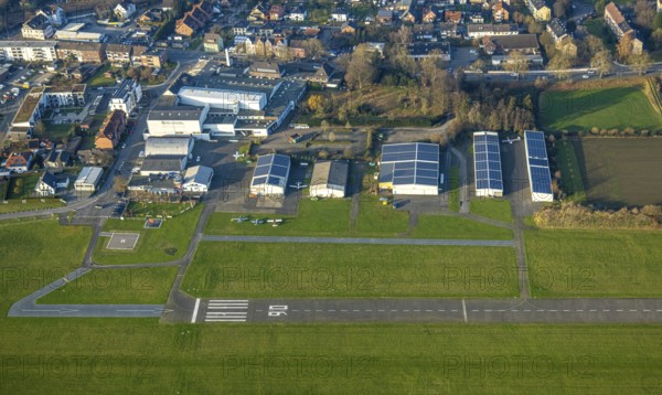 Aerial view, Hamm Lippewiesen airfield with hangars and solar roof, Heessen district, Hamm, Ruhr area, North Rhine-Westphalia, Germany