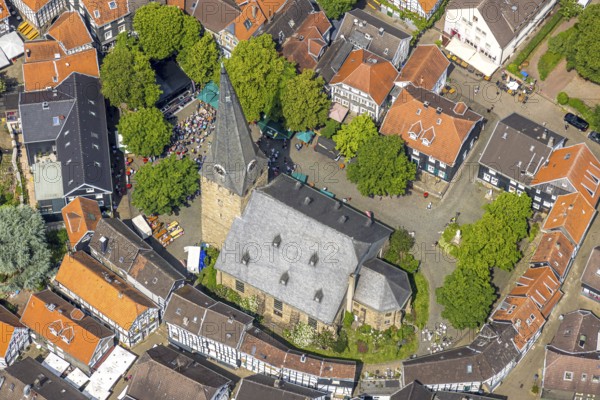 Aerial view, historical old town centre with St.-Georg-Kirche and town festival on the church square, red roofs and green trees, Hattingen, Ruhr area, North Rhine-Westphalia, Germany, Old Town, place of worship, City, DE, Europe, religious community, place of worship, property tax, holy place, real estate, church, parish, denomination, aerial view, aerial photography, aerial photography, religion, religious site, city centre, overview, bird's-eye view, residential area, living and life, residential area, quality of life, residential quarter, housing estate, residential district, birds-eyes view, overview
