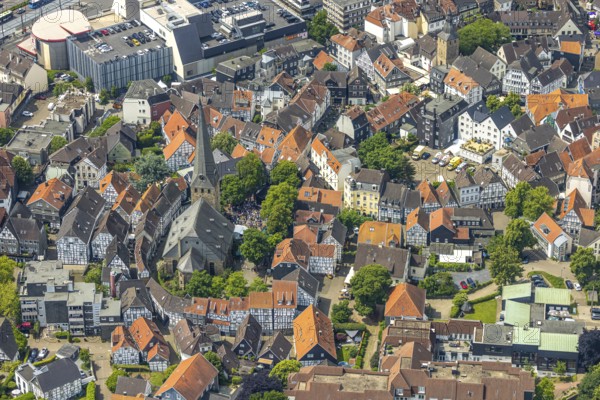 Aerial view, historic old town centre with St.-Georg-Kirche and city festival on the church square, red roofs and green trees, emergency service ASB with car and tent during the old town city festival Hattingen, Ruhr area, North Rhine-Westphalia, Germany, old town, place of worship, city, DE, Europe, religious community, place of worship, property tax, Hattingen, holy place, real estate, church, parish, denomination, aerial view, aerial photography, aerial photography, religion, religious site, city centre, overview, bird's-eye view, residential area, living and life, residential area, quality of life, residential quarter, housing estate, residential district, birds-eyes view, overview