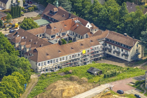 Aerial view, Theresia-Albers-Stiftung Altenheim St. Josef, construction site and facade with scaffolding, road construction site, Hattingen, Ruhr area, North Rhine-Westphalia, Germany, construction work, construction area, building site, building plots, construction project, construction site, DE, Europe, large construction site, aerial photograph, aerial photography, aerial photography, new building, overview, bird's-eye view, bird's-eye view, overview