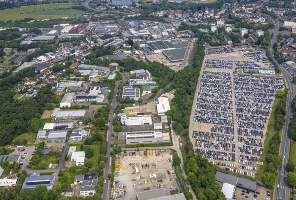 Aerial view, commercial area Beuler Höhe and commercial area Nierenhofer Straße, former O&K site for planned city quarter, currently large car park with hundreds of cars, Hattingen police station, Rosenthal, Hattingen, Ruhr area, North Rhine-Westphalia, Germany, cars, DE, development, Europe, vehicles, areas, buildings, site, commercial, commercial enterprises, commercial area, commercial property, commercial park, commercial site, commercial use, large car park, hundreds of cars, industry, industrial area, industrial site, infrastructure, aerial view, aerial photography, aerial photography, Nierenhofer Straße, car park, police, police station, region, urban development, urban planning, streets, structure, urban, overview, urban, bird's-eye view, former O&K site, planned urban quarter, modern use, overview, overview, public services