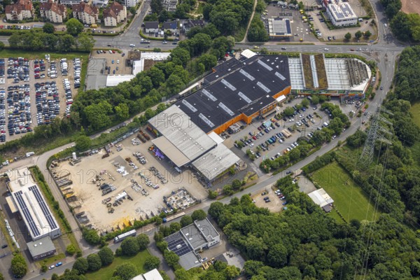 Aerial view, commercial area Beuler Höhe, Obi Baumarkt, Rosenthal, Hattingen, Ruhr area, North Rhine-Westphalia, Germany, cars, DE, development, Europe, vehicles, areas, buildings, terrain, commercial, commercial enterprises, commercial area, commercial property, commercial park, commercial site, commercial use, large car park, hundreds of cars, industry, industrial area, industrial site, infrastructure, aerial view, aerial photography, aerial photography, Nierenhofer Straße, car park, police, police station, region, urban development, urban planning, streets, structure, urban, overview, urban, bird's-eye view, birds-eyes view, former O&K site, planned urban quarter, modern use, overview, overview, public services