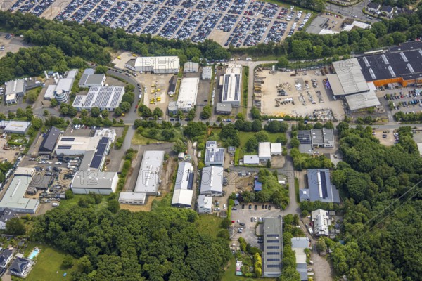 Aerial view, commercial area Beuler Höhe and commercial area Nierenhofer Straße, former O&K site for planned city quarter, currently large car park with hundreds of cars, Hattingen police station, Rosenthal, Hattingen, Ruhr area, North Rhine-Westphalia, Germany, cars, DE, development, Europe, vehicles, areas, buildings, site, commercial, commercial enterprises, commercial area, commercial property, commercial park, commercial site, commercial use, large car park, hundreds of cars, industry, industrial area, industrial site, infrastructure, aerial view, aerial photography, aerial photography, Nierenhofer Straße, car park, police, police station, region, urban development, urban planning, streets, structure, urban, overview, urban, bird's-eye view, former O&K site, planned urban quarter, modern use, overview, overview, public services