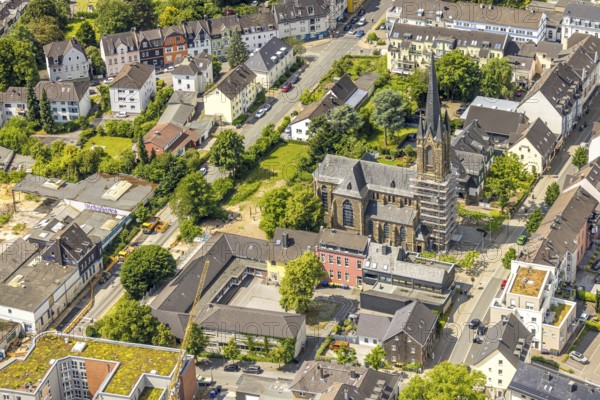 Aerial view, construction site catholic church St. Suitbertus with scaffolding on the church tower, Friedrich-Bödecker-Kreis North Rhine-Westphalia non-profit organisation, Leubeck, Heiligenhaus, Ruhr area, North Rhine-Westphalia, Germany, construction work, construction area, building site, building plots, construction measure, construction project, construction site, DE, Europe, aerial view, aerial photography, aerial photography, new building, overview, bird's-eye view, overview