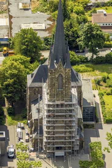 Aerial view, construction site catholic church St. Suitbertus with scaffolding on the church tower, Leubeck, Heiligenhaus, Ruhr area, North Rhine-Westphalia, Germany, construction work, construction area, building site, building plots, construction project, construction site, DE, Europe, aerial view, aerial photography, aerial photography, new building, overview, bird's-eye view, overview