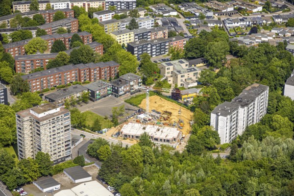 Aerial view, high-rise buildings and apartment blocks on Rhönstraße, construction site with new building on Europaplatz for apartment blocks, Oberilp, Heiligenhaus, Ruhr area, North Rhine-Westphalia, Germany, construction work, construction area, construction site, building plots, construction project, construction project, construction site, DE, Europe, property tax, real estate, aerial view, aerial photography, aerial photography, new building, overview, bird's-eye view, residential complex, living and living, residential area, residential quality, residential neighbourhood, residential estate, residential district, birds-eyes view, overview