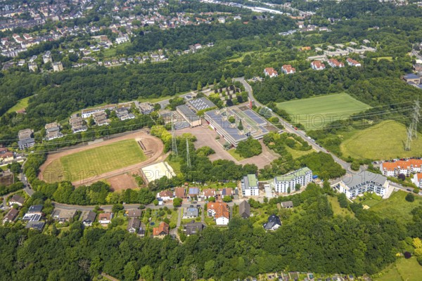 Aerial view, sports centre Holthausen and grammar school Holthausen Lindstockstraße with solar panels, open space and green area next to the school centre, planned construction of a special school plus new indoor swimming pool, Hattingen, Ruhr area, North Rhine-Westphalia, Germany, construction area, education, educational institution, DE, Europe, photovoltaic, grammar school, educational institute, aerial view, aerial photography, aerial photography, photovoltaic system, school, solar system, solar roof, solar energy, solar panels, solar power system, overview, bird's-eye view, overview