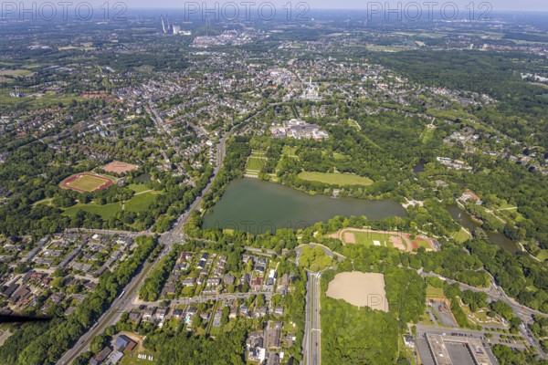 Aerial view, Berger See and neighbouring Schloss Berge with castle park, moated castle and hotel, Knappschaft Kliniken Gelsenkirchen-Buer and Rehaklinik Berger See, on the left district sports facility Lohmühle, above city view district Buer, Erle, Gelsenkirchen, Ruhr area, North Rhine-Westphalia, Germany