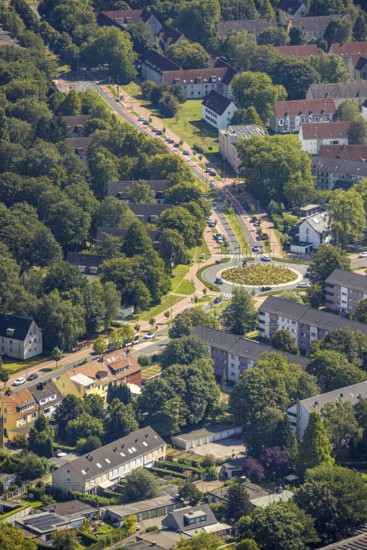 Aerial view, road traffic and planted roundabout Horster Straße and Wiesmannstraße, red marked cycle path, Gladbeck lettering in colourful capital letters with sculpture Alwine, Brauck, Gladbeck, Ruhr area, North Rhine-Westphalia, Germany