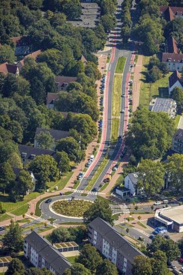 Aerial view, road traffic and planted roundabout Horster Straße and Wiesmannstraße, red marked cycle path, Gladbeck lettering in colourful capital letters with sculpture Alwine, Brauck, Gladbeck, Ruhr area, North Rhine-Westphalia, Germany