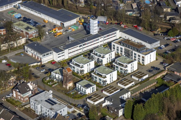 Aerial view, fire brigade rescue station and fire brigade defence tower, new housing estate Roter Turm, behind central depot Gladbeck ZBG with solar roof, Gladbeck, Ruhr area, North Rhine-Westphalia, Germany