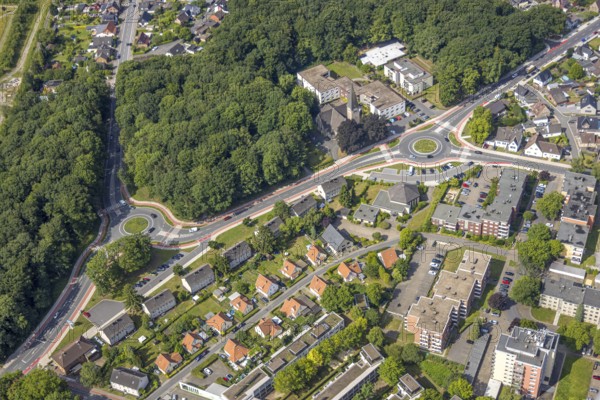 Aerial view, roundabout and cycle paths Friedrich-Ebert-Straße and Hammer Straße with Evangelical Cross Church and EFG Hamm Bockum-Hövel Baptist Church, roundabout and cycle paths Hammerstraße and Bülowstraße with wooded area and car park, Bockum-Hövel, Hamm, Ruhr area, North Rhine-Westphalia, Germany